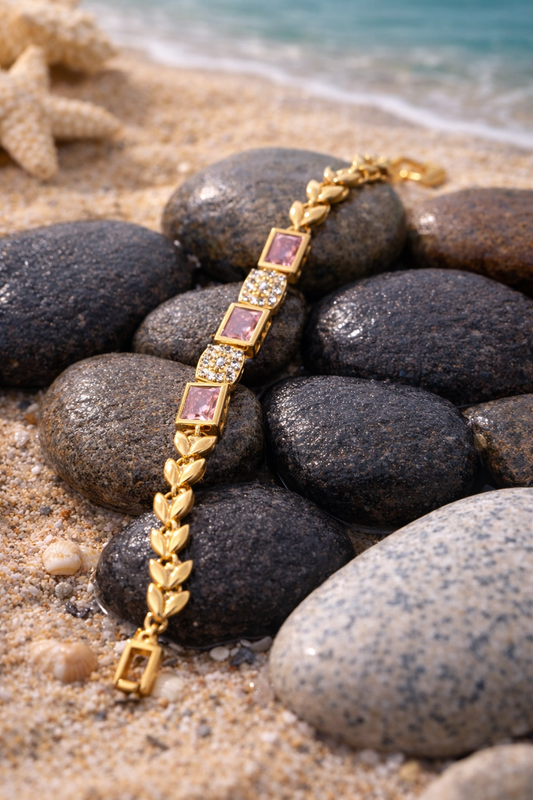 Elegant Gold Heart Bracelet with Pink Stone Accents