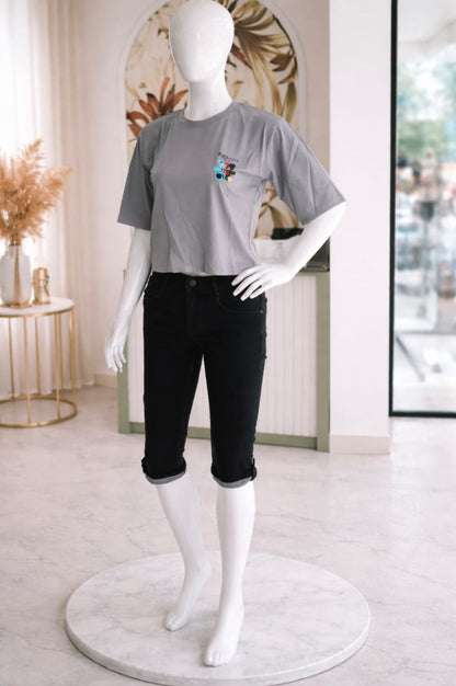 Women's Black crapped jeans with rolled cuffs